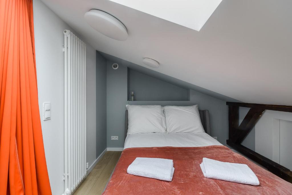 Posteľ alebo postele v izbe v ubytovaní Zoliborz P&O Serviced Apartments