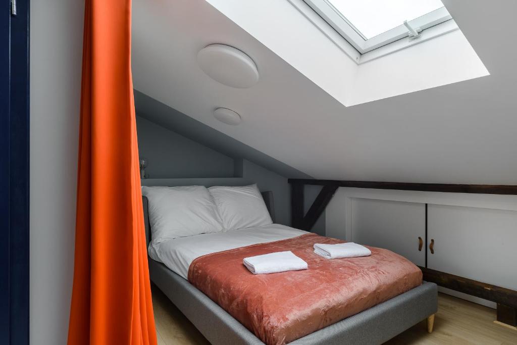 Posteľ alebo postele v izbe v ubytovaní Zoliborz P&O Serviced Apartments