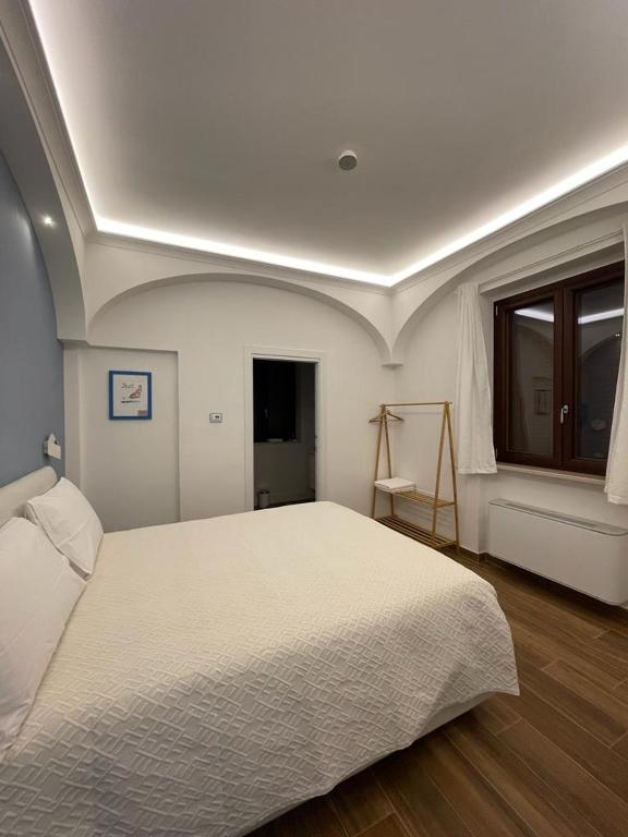Łóżko lub łóżka w pokoju w obiekcie Maera B&B Ravello