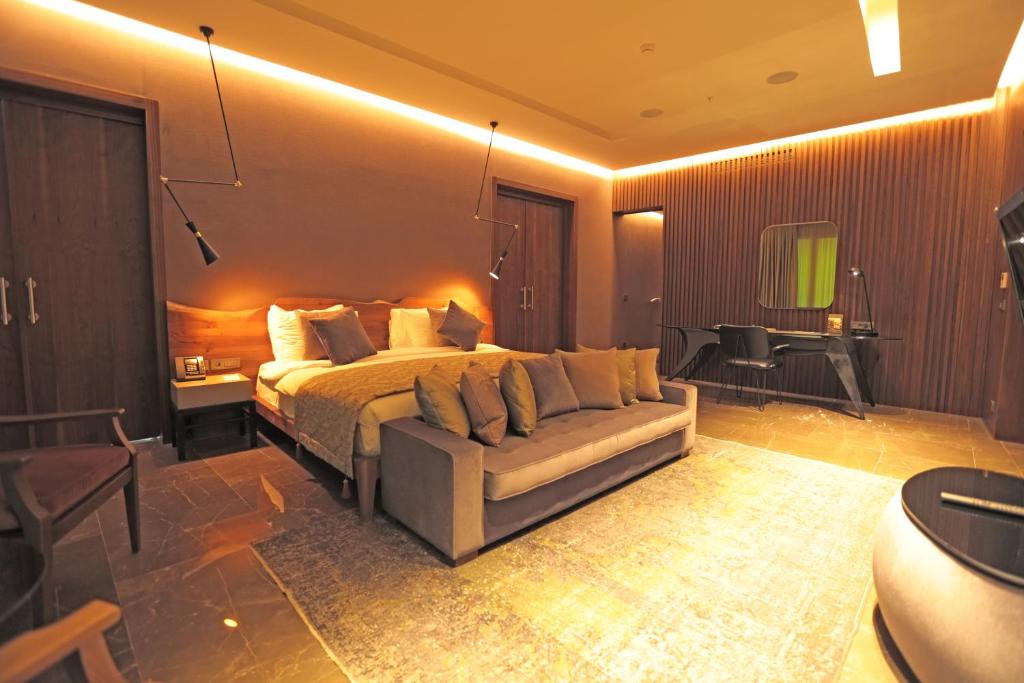 Cama ou camas em um quarto em Tasigo Eskisehir