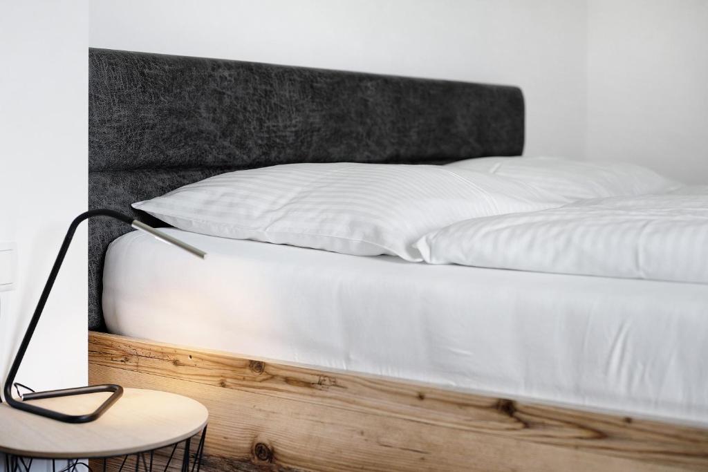 Postel nebo postele na pokoji v ubytování Haus Mader 2