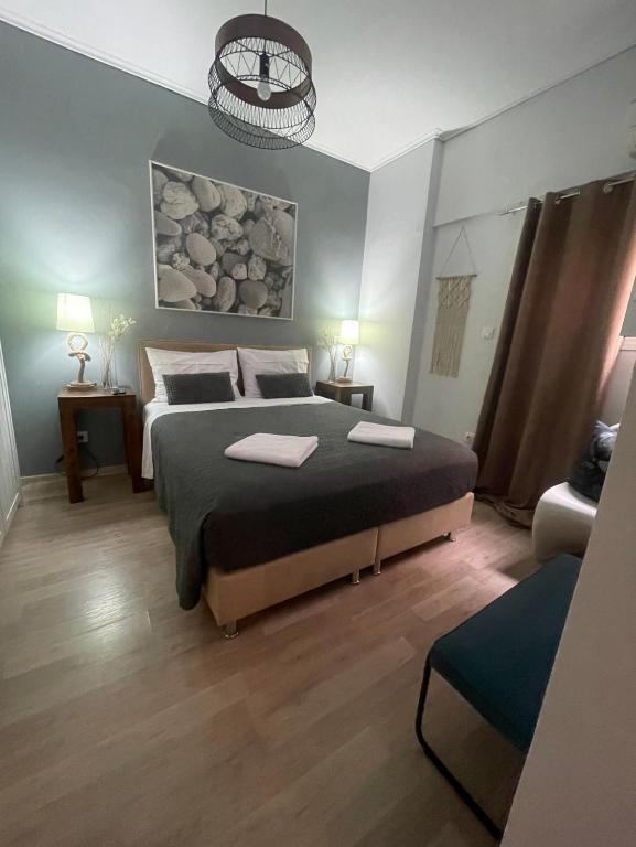 Postel nebo postele na pokoji v ubytování Marina Zeas Seaside Studio-MarinaQ