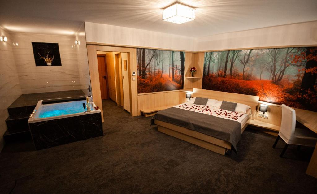 Voodi või voodid majutusasutuse Hotel Kras toas