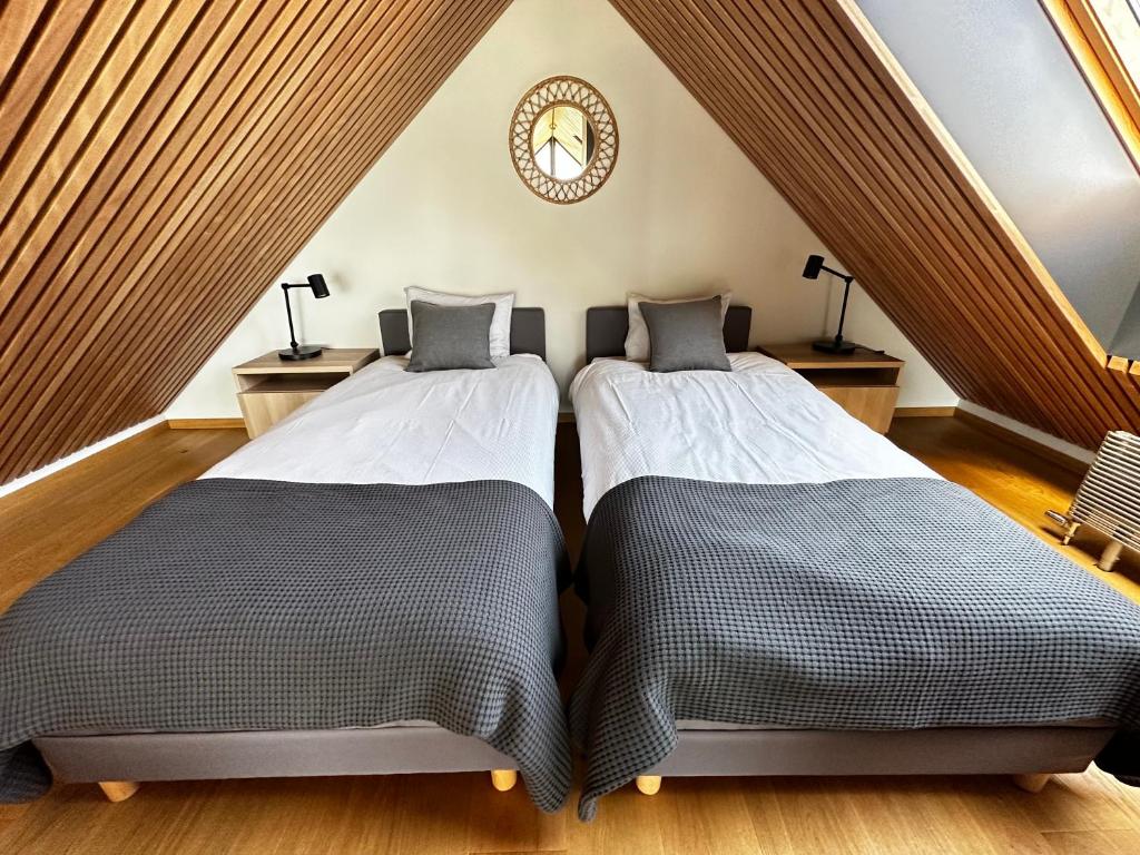 Postel nebo postele na pokoji v ubytování Apartamenty Nero