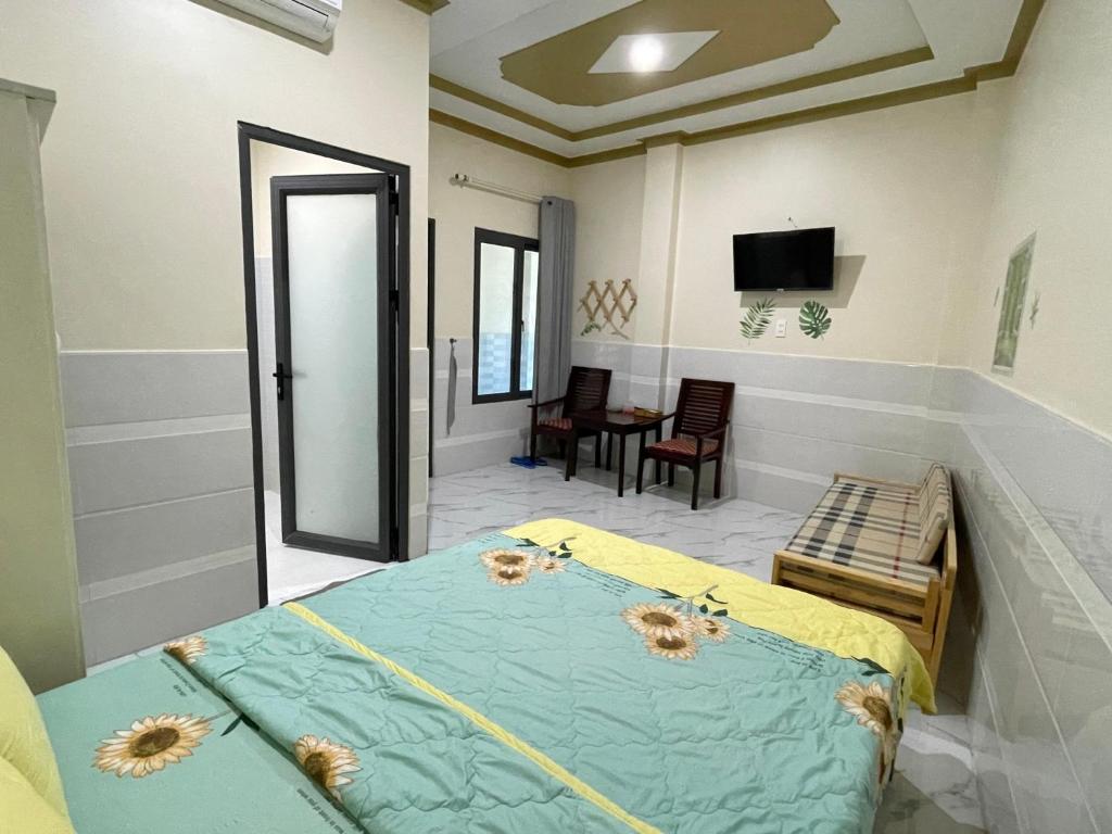 Giường trong phòng chung tại T'H Homestay