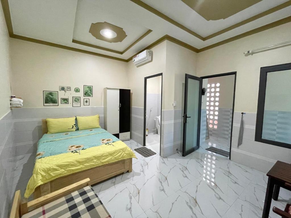 Giường trong phòng chung tại T'H Homestay