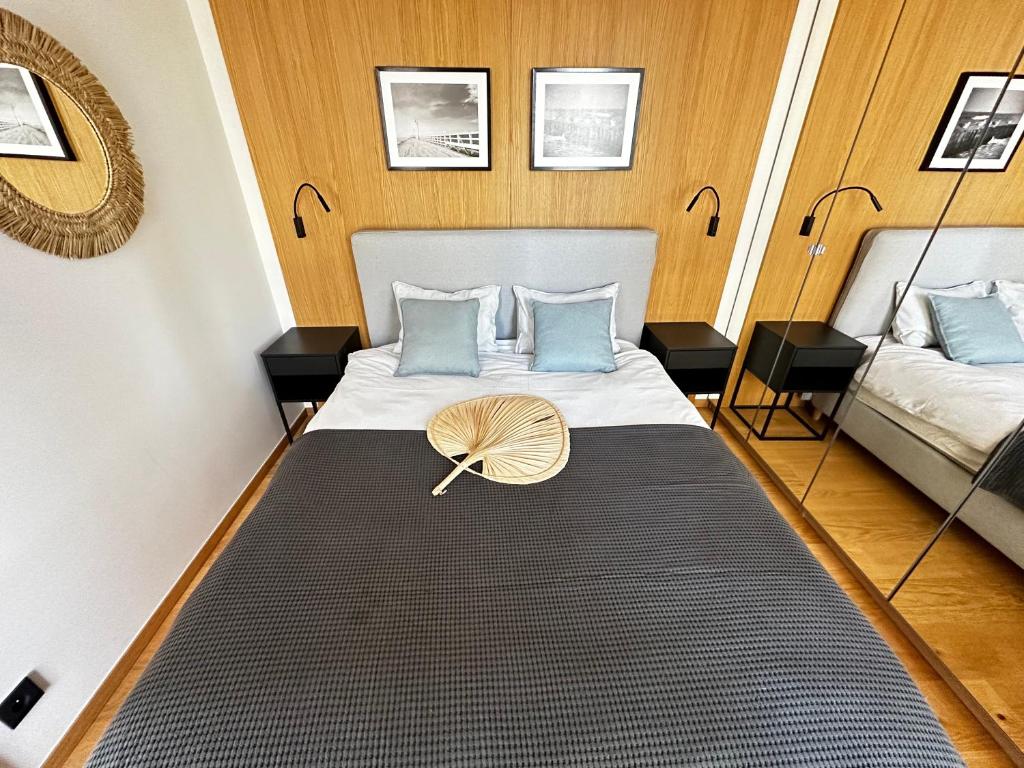 Postel nebo postele na pokoji v ubytování Apartamenty Nero
