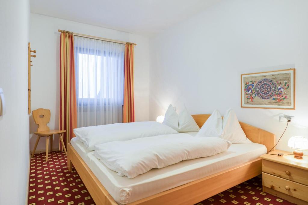 Posteľ alebo postele v izbe v ubytovaní Apparthotel Feldhof - Living and Bistro