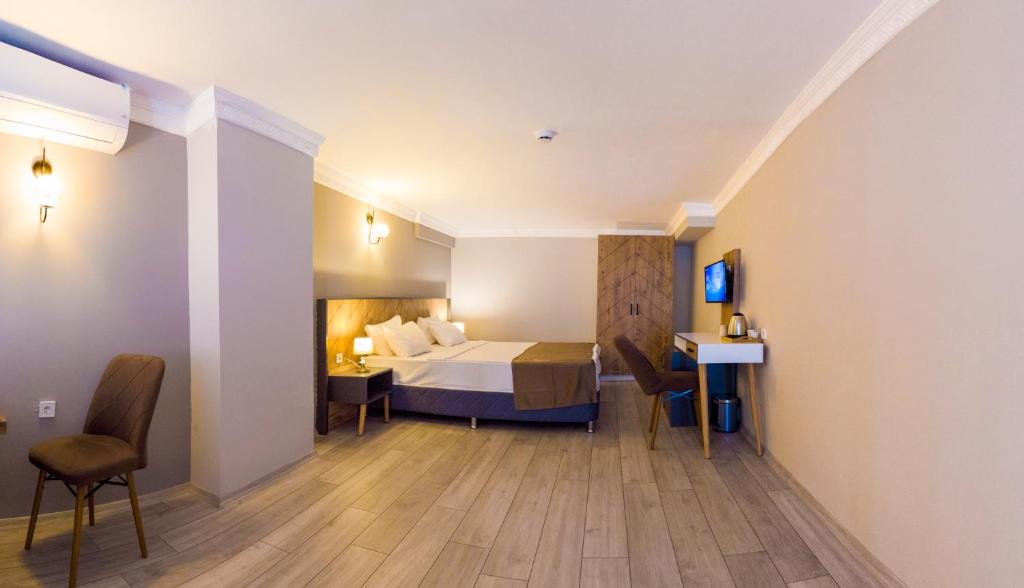 Postel nebo postele na pokoji v ubytování PRIVADO HOTELS