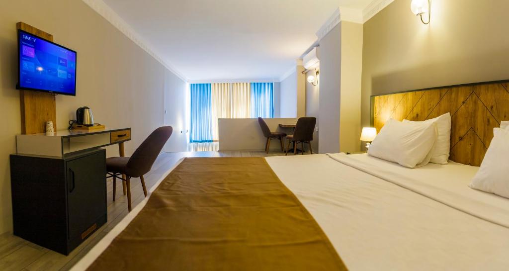 Postel nebo postele na pokoji v ubytování PRIVADO HOTELS