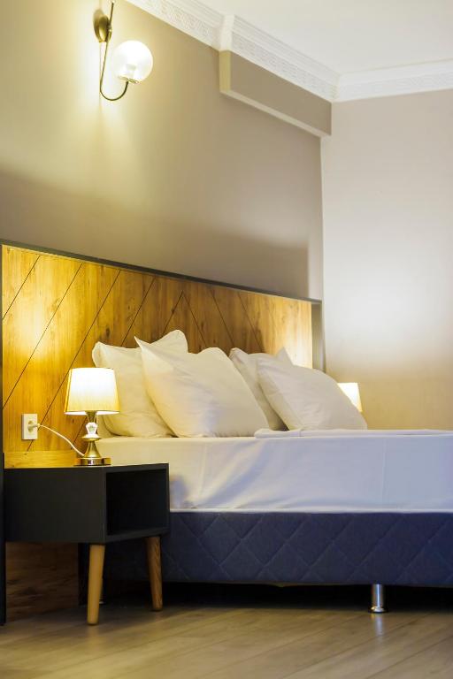 Postel nebo postele na pokoji v ubytování PRIVADO HOTELS