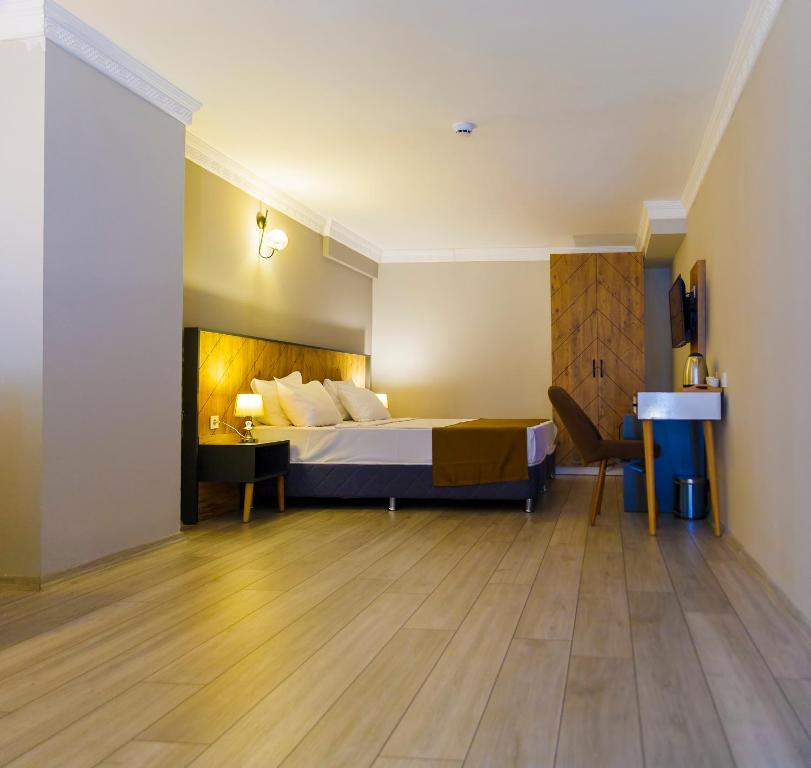 Postel nebo postele na pokoji v ubytování PRIVADO HOTELS