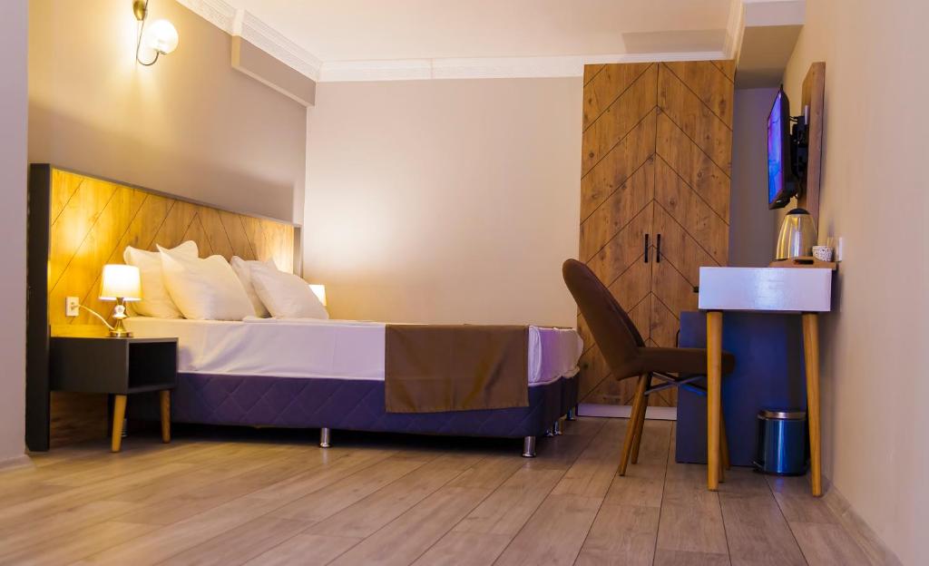 Postel nebo postele na pokoji v ubytování PRIVADO HOTELS