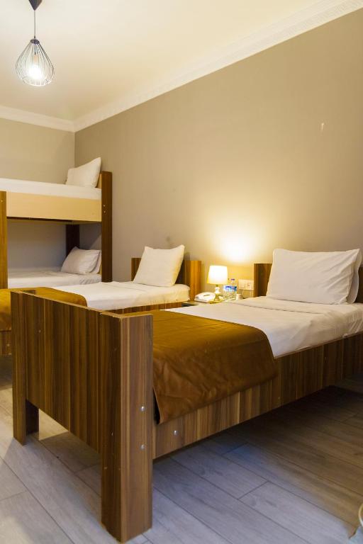 Postel nebo postele na pokoji v ubytování PRIVADO HOTELS
