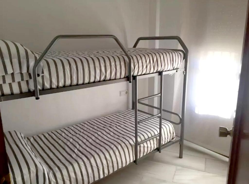 Postel nebo postele na pokoji v ubytování Comfortable House in Córdoba, ideal for families and friends