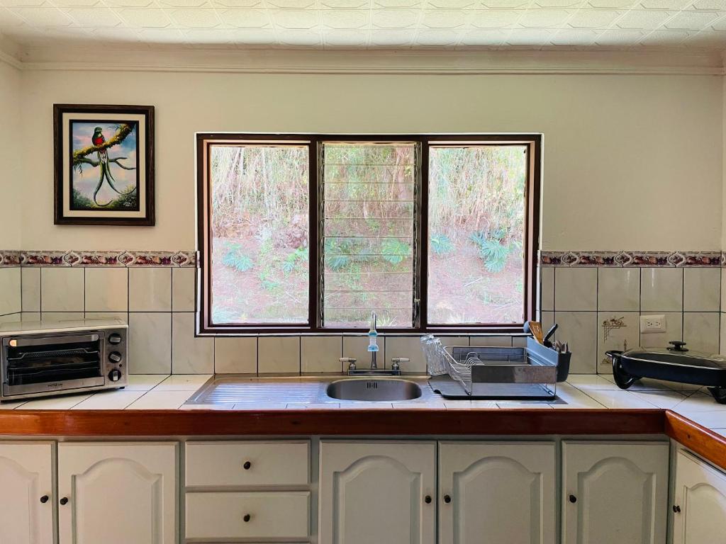 Kuchyň nebo kuchyňský kout v ubytování Casa Mano de Tigre