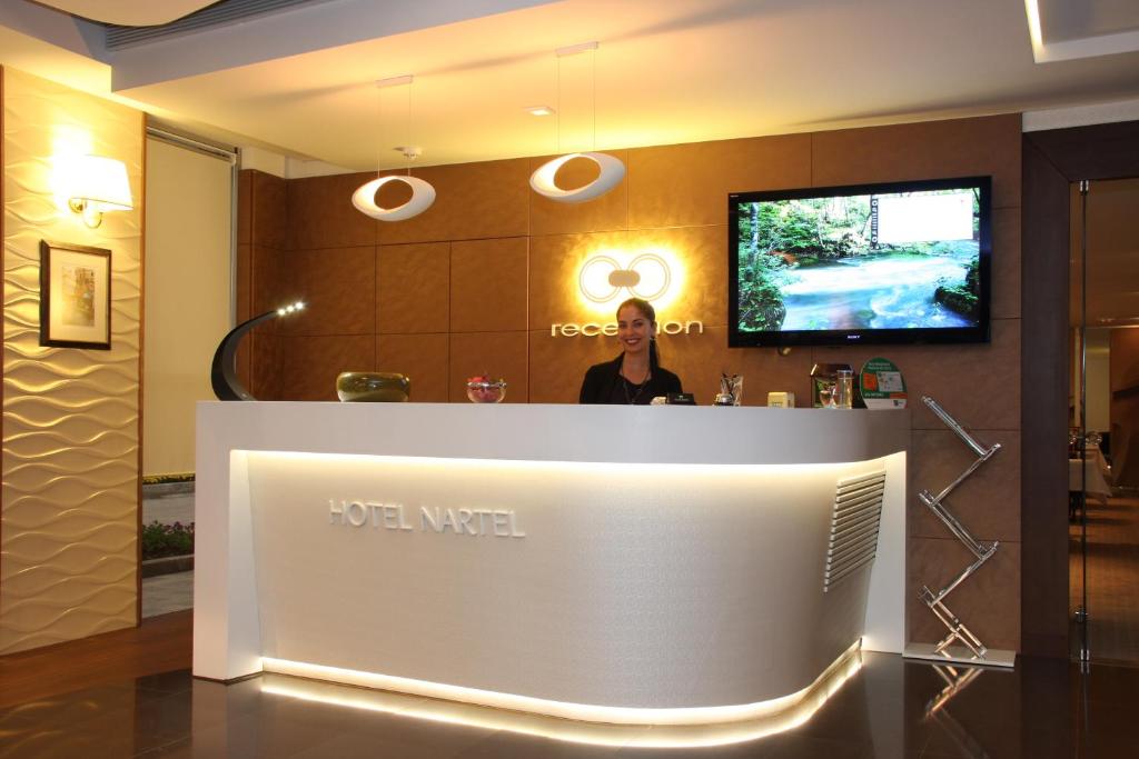 TV a/nebo společenská místnost v ubytování Hotel Nartel
