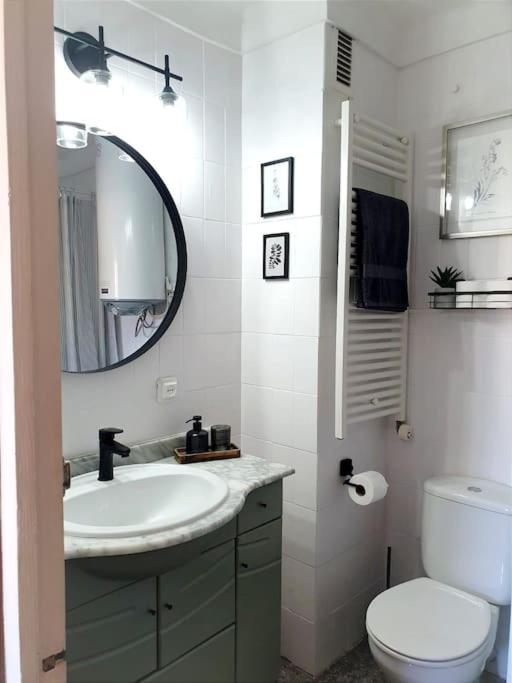 Koupelna v ubytování somriu Apartament Fenals Platja