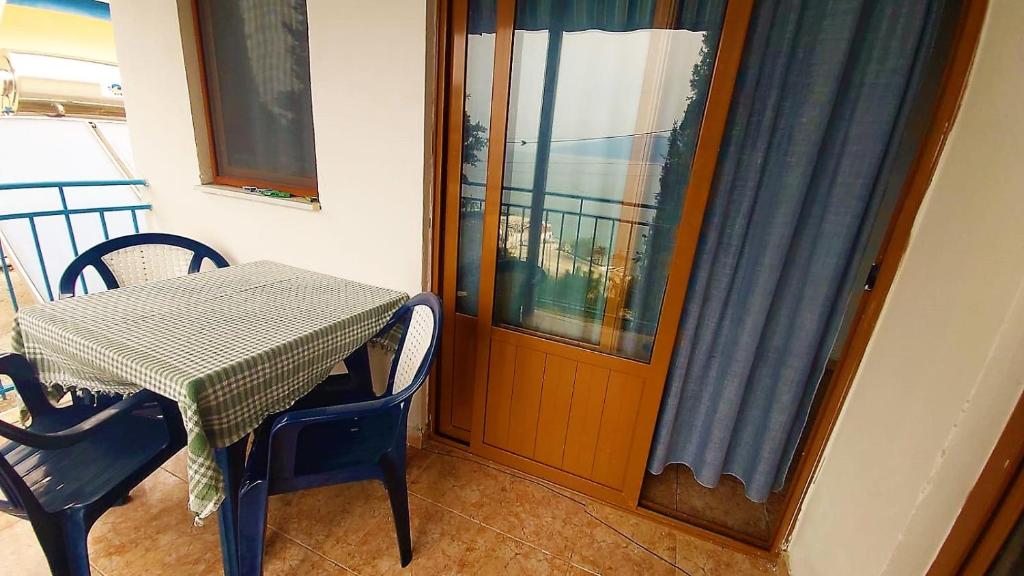 Third Room of Cozy Beachside Haven - Panoramic Radhime Retreat with Balcony Dining - Image 4