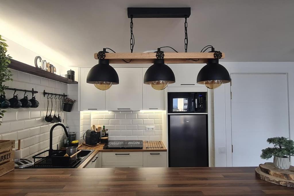 Kuchyň nebo kuchyňský kout v ubytování Sunsetmare Vacational Apartment