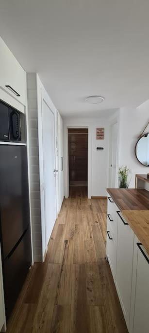 Kuchyň nebo kuchyňský kout v ubytování Sunsetmare Vacational Apartment