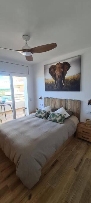 Postel nebo postele na pokoji v ubytování Sunsetmare Vacational Apartment