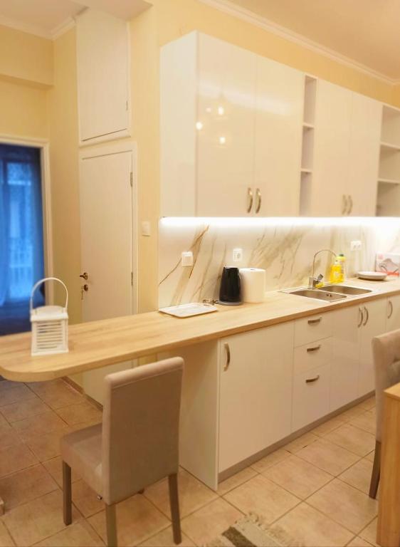 Kuchyň nebo kuchyňský kout v ubytování Elmar Apartment