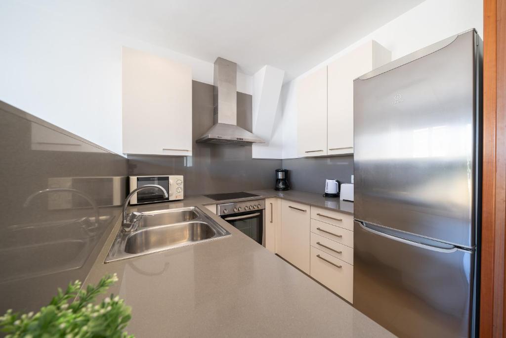 Kuchyňa alebo kuchynka v ubytovaní Apartamento Luciana