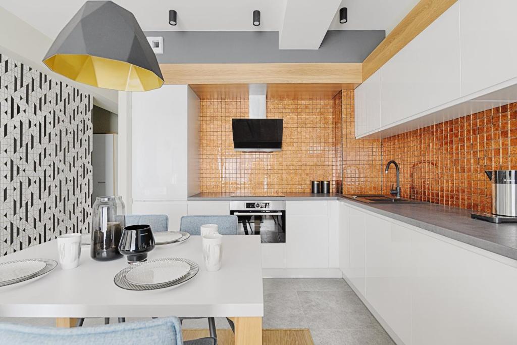 Kuchyň nebo kuchyňský kout v ubytování Sea Breeze Apartment