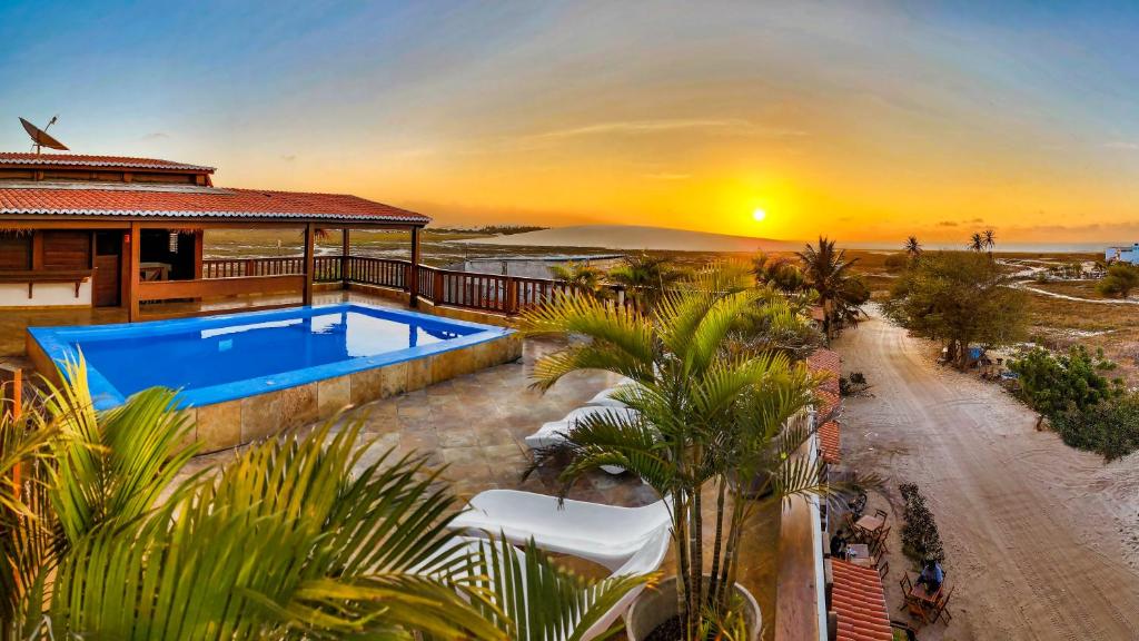 Bazén v ubytování Mini Hotel Dunas nebo v jeho okolí