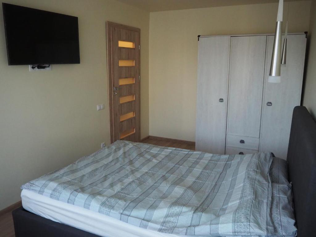Ένα ή περισσότερα κρεβάτια σε δωμάτιο στο B&K apartments