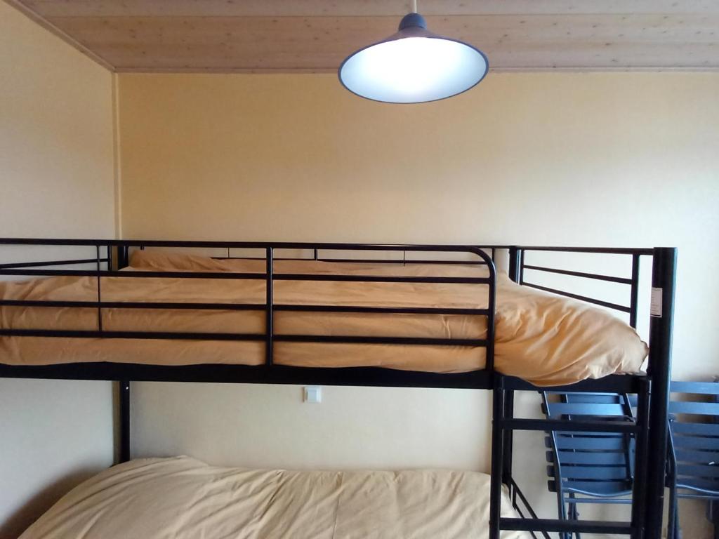 Postel nebo postele na pokoji v ubytování Bel appartement 2 chambres rénové face mer avec balcon et WIFI - Saint-Jean-de-Monts - FR-1-323-273