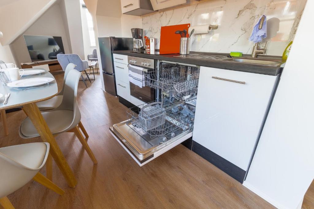 Kuchyň nebo kuchyňský kout v ubytování Daniels Apartment an der Schloßbrücke