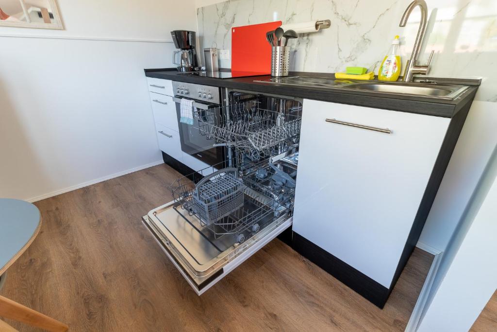 Kuchyň nebo kuchyňský kout v ubytování Daniels Apartment an der Schloßbrücke