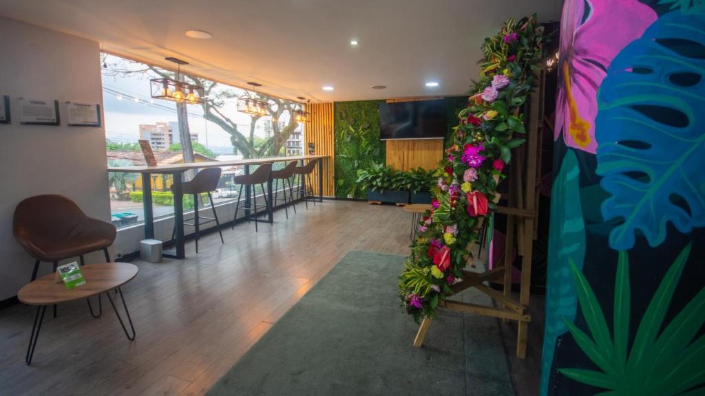 Posezení v ubytování Greenview Medellin By St Hoteles
