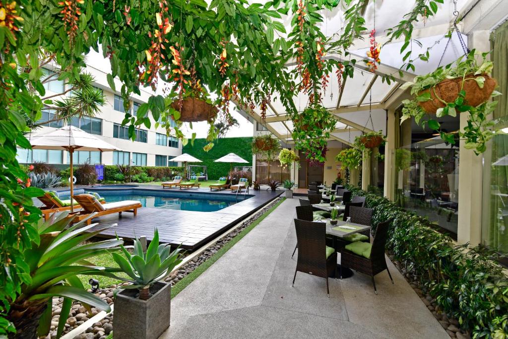 Bazén v ubytování Auténtico Hotel nebo v jeho okolí