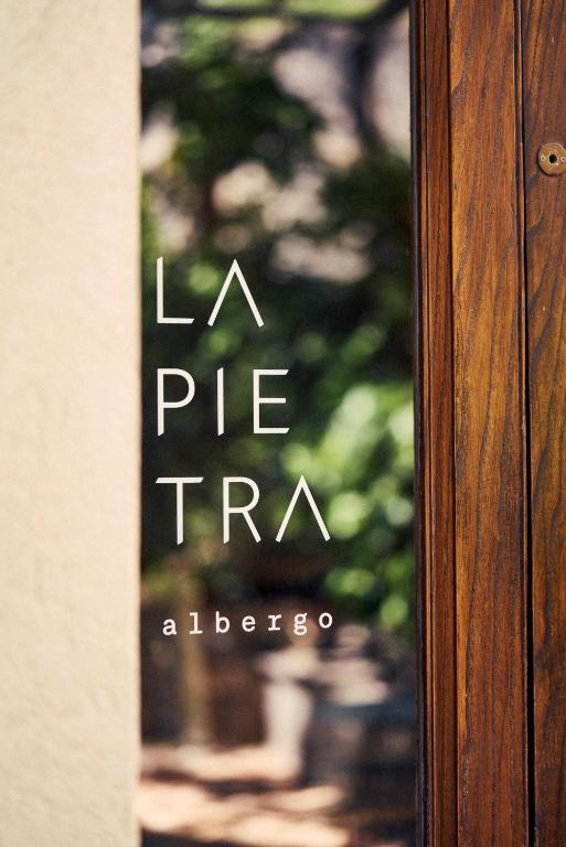 Certifikát, hodnocení, plakát nebo jiný dokument vystavený v ubytování Albergo La Pietra