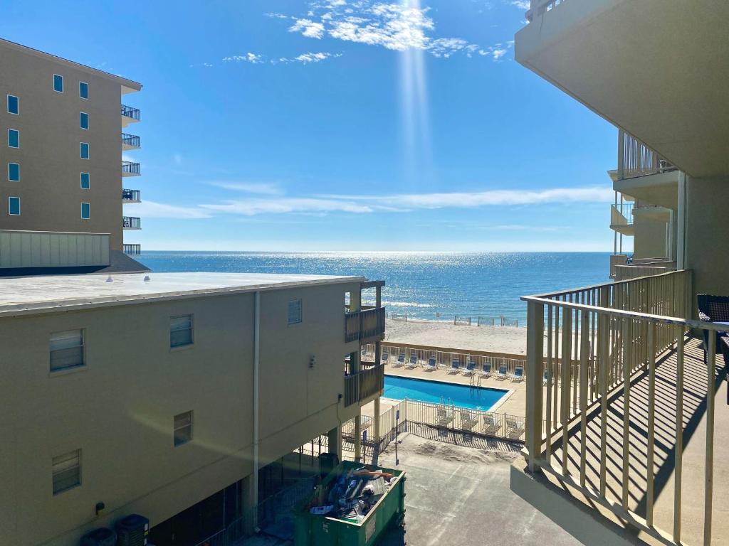 a view of the ocean from the balcony of a building at Gulf Village 312 by ALBVR - Oversized balcony offers beautiful, unobstructed indirect views in Gulf Shores
