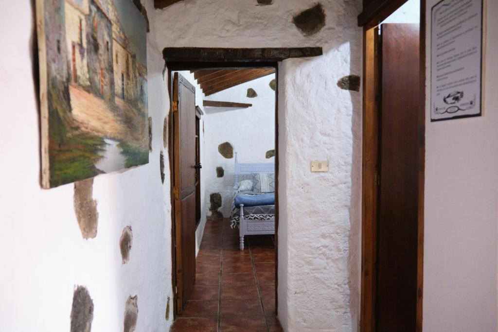 Postel nebo postele na pokoji v ubytování Casa Rural Felipe Luis