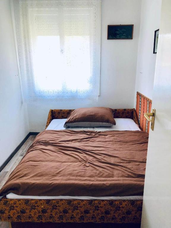 A bed or beds in a room at reginavendeghaz