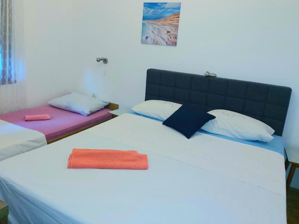 Postel nebo postele na pokoji v ubytování Apartman Arija-Pino