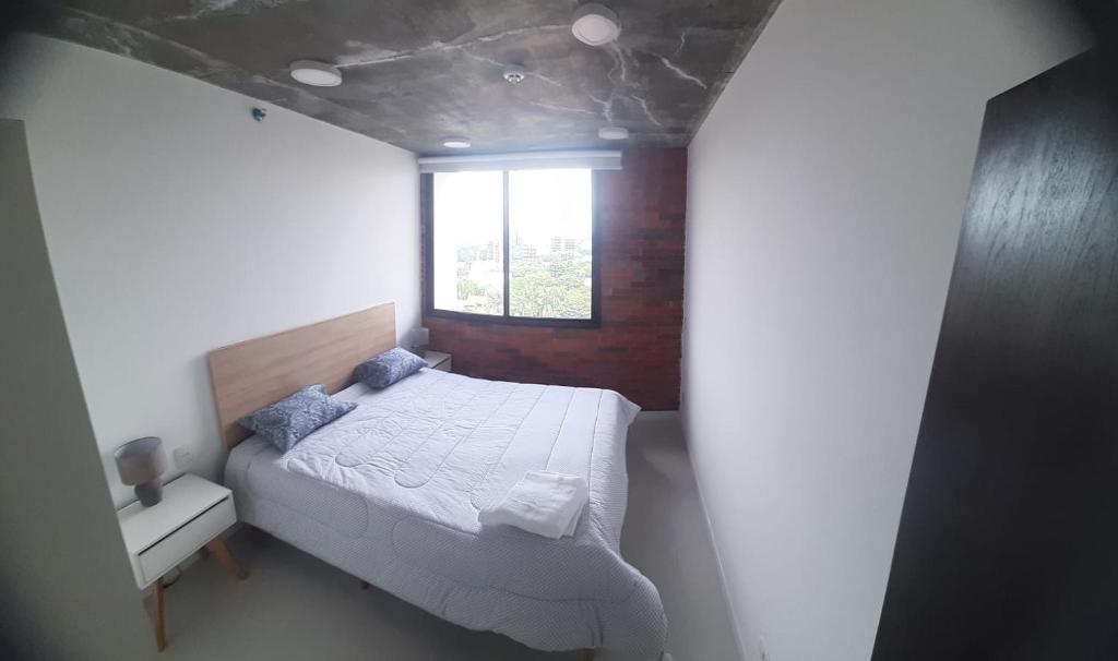 Postel nebo postele na pokoji v ubytování Edificio Flats del sol
