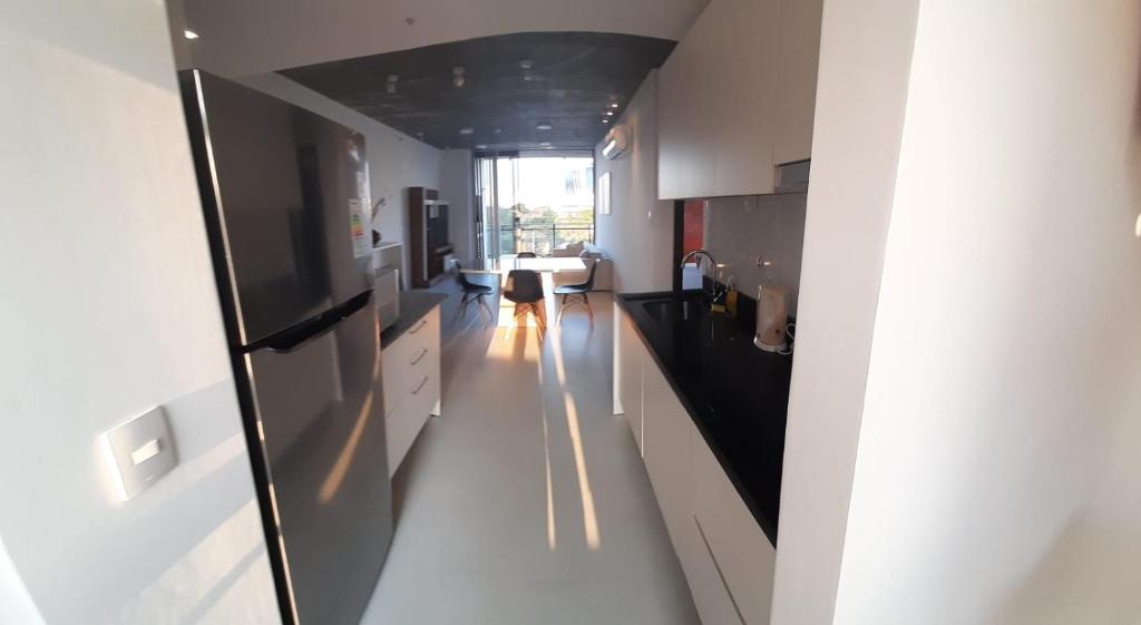 TV a/nebo společenská místnost v ubytování Edificio Flats del sol
