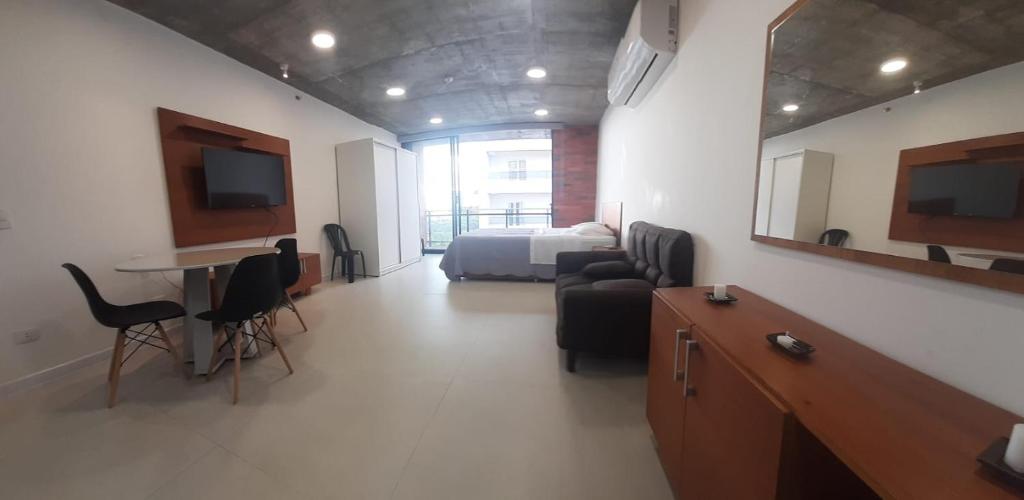 TV a/nebo společenská místnost v ubytování Edificio Flats del sol