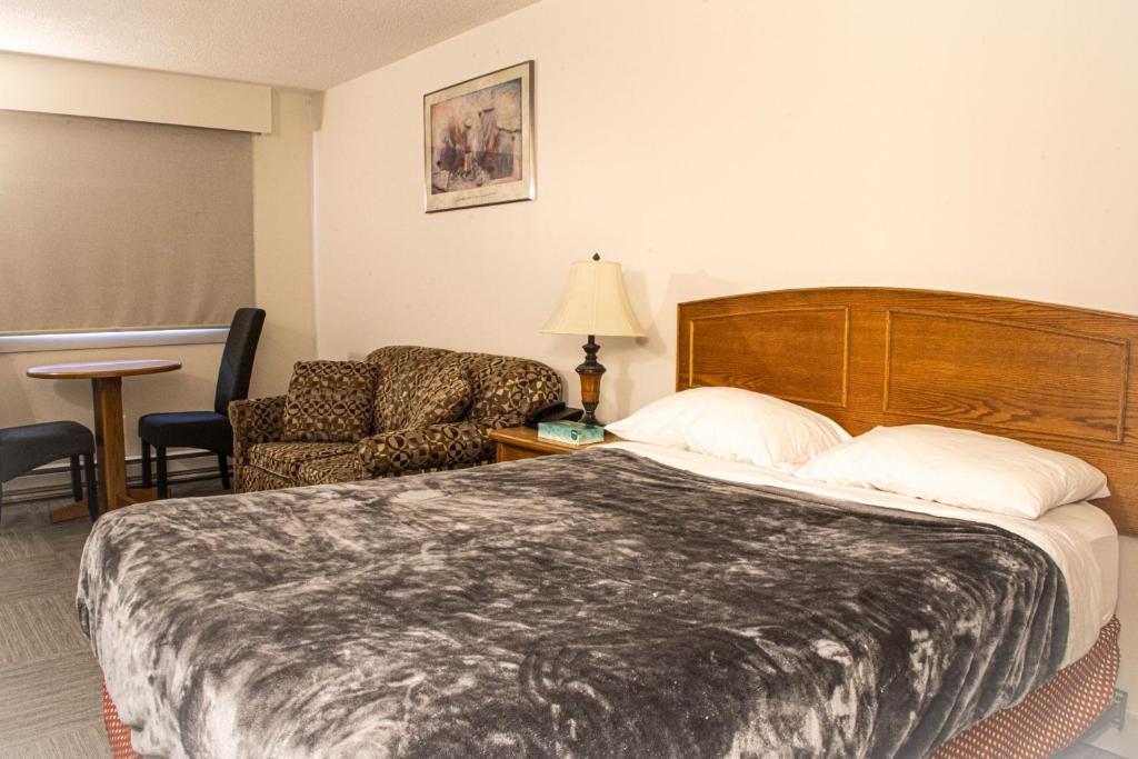 Postel nebo postele na pokoji v ubytování Grandview Motel