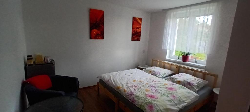 Postel nebo postele na pokoji v ubytování Penzion U Kapličky