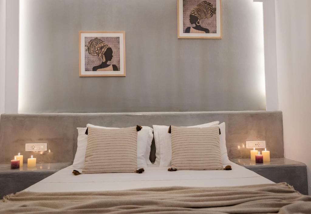 Postel nebo postele na pokoji v ubytování White Breeze Villas