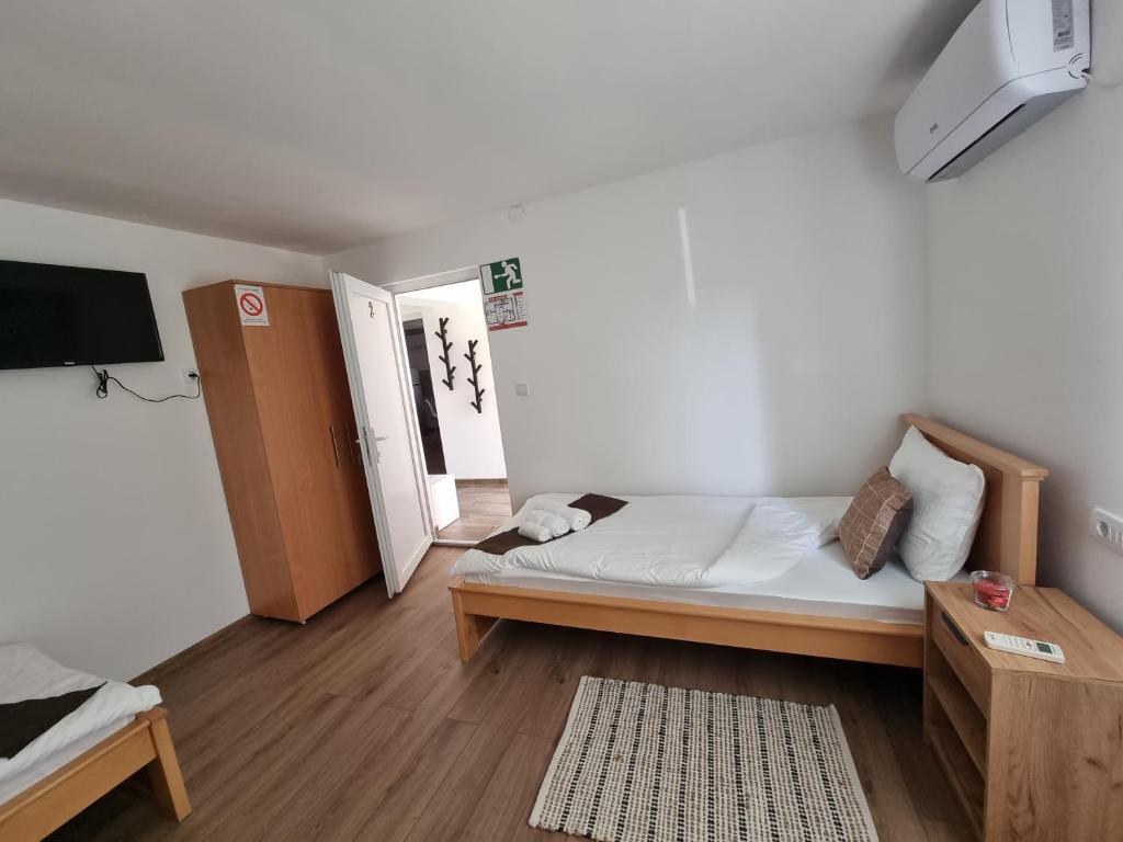 Krevet ili kreveti u jedinici u objektu Apartmani - Kladovski Konak