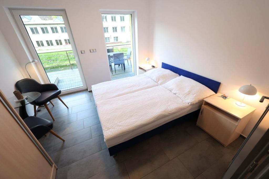 Postel nebo postele na pokoji v ubytování Apartmány Vír