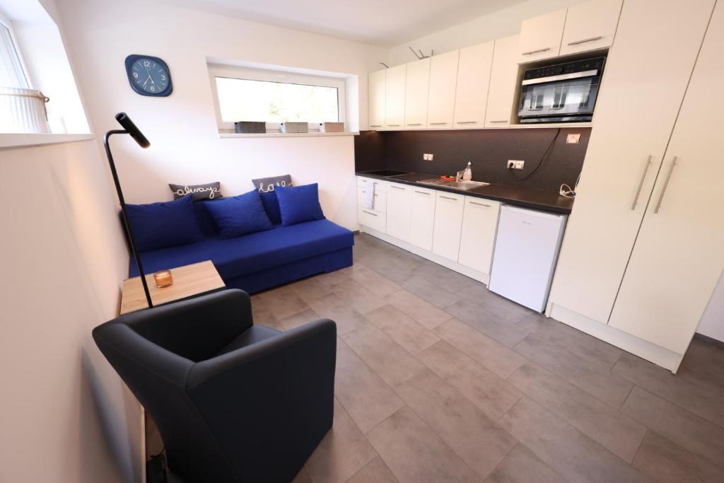 Kuchyň nebo kuchyňský kout v ubytování Apartmány Vír